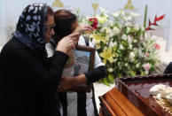 Relatives of a man who died in an explosion of a fuel pipeline ruptured by oil thieves react during a funeral mass at a church in the municipality of Tlahuelilpan, state of Hidalgo, Mexico January 21, 2019. REUTERS/Mohammed Salem