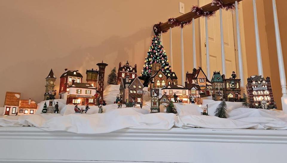 Carol and Al Baldy have collected the buildings of this snow village over more than three decades. Their sons enjoyed watching the tiny town grow through the years.