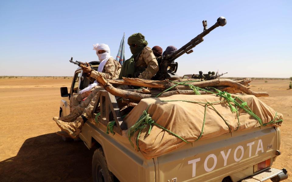 Fighters from a local armed group Gatia, and pro-government armed group Mouvement de Salut de lAzawad - SOULEYMANE AG ANARA/AFP via Getty Images