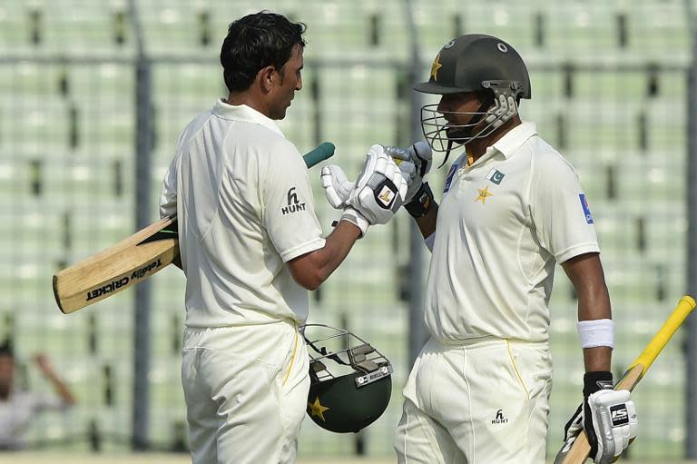 Pakistan's Younis Khan (left) and Azhar Ali put on 250 for the 3rd wicket on the first day of the second Test against Bangladesh in Dhaka on May 6, 2015