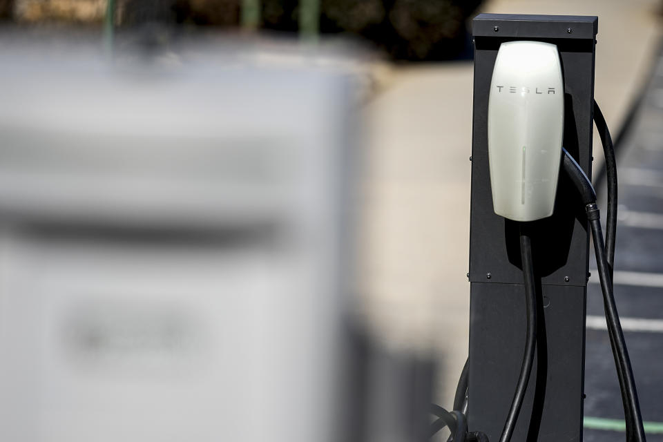 A top concerns is whether to invest in private electric vehicle charging stations, or rely on shared infrastructure. (AP Photo/Mike Stewart)