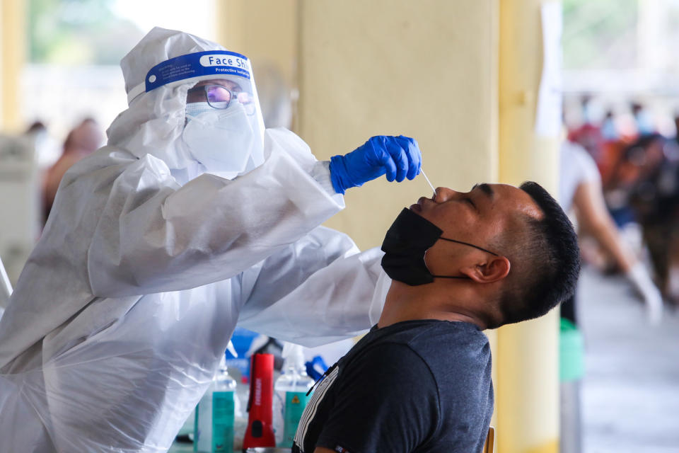 Health officers conduct the Covid-19 antigen rapid test at Laurent Bleu, CMC Centre Cheras January 11, 2021. — Picture by Choo Choy May