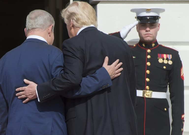 US President Donald Trump and Israeli Prime Minister Benjamin Netanyahu walk into the White House on February 15 2017