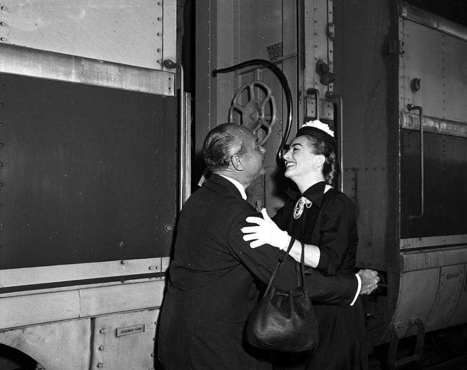 May 30, 1952: Joan Crawford of the movies greets Bill Haimes, a former star himself, on her arrival in Fort Worth for the Mint Bar Party of the Fort Worth Art Association. Fort Worth Star-Telegram archives/UT Arlington Special Collections