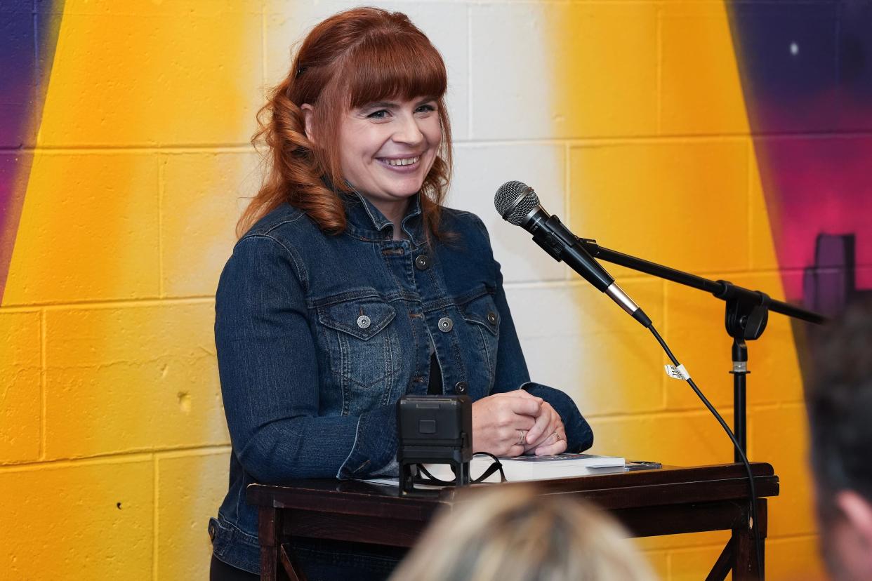 Meg Shaffer, a USA Today bestsellng author, smiled as she answered questions about her second novel The Lost Story during a release party and book reading at the Carmichael's Bookstore in Louisville, Ky. on July 16, 2024. Shaffer lives in Kentucky.