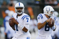 Indianapolis Colts quarterbacks Jacoby Brissett (7) and Chad Kelly warm up for the team's FL preseason football game against the Cincinnati Bengals, Thursday, Aug. 29, 2019, in Cincinnati. (AP Photo/Gary Landers)