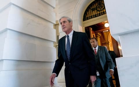 Former FBI director and special counsel Robert Mueller has headed the probe into Russian interference in the 2016 Trump campaign   - Credit: AP Photo/Andrew Harnik