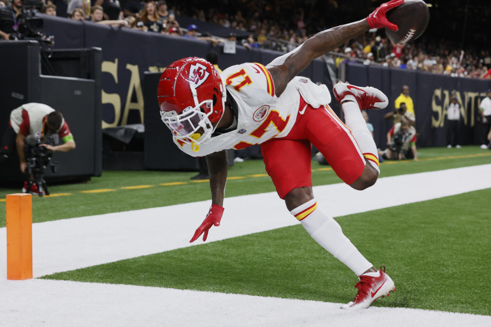 Kansas City Chiefs wide receiver Richie James (17) scores a touchdown in the first half of a preseason NFL football game against the New Orleans Saints in New Orleans, Sunday, Aug. 13, 2023. (AP Photo/Butch Dill)