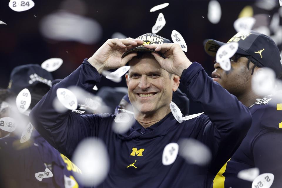 Jim Harbaugh, national champion. (Carmen Mandato/Getty Images)