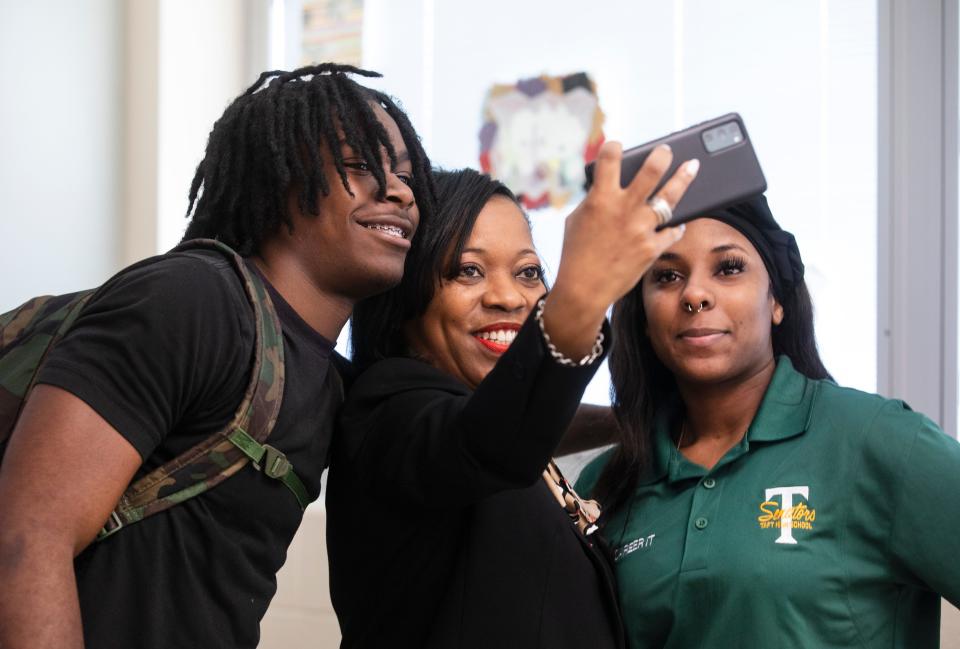 Iranetta Wright, Cincinnati Public Schools' new superintendent, visited Taft Information Technology High School on her first day on the new job, Monday, May 2, 2022. She took a selfie with Jakeim Sullivan, 18, left and Iyanna Harris, 18. Sullivan was Taft's salutatorian and Harris, the valedictorian.