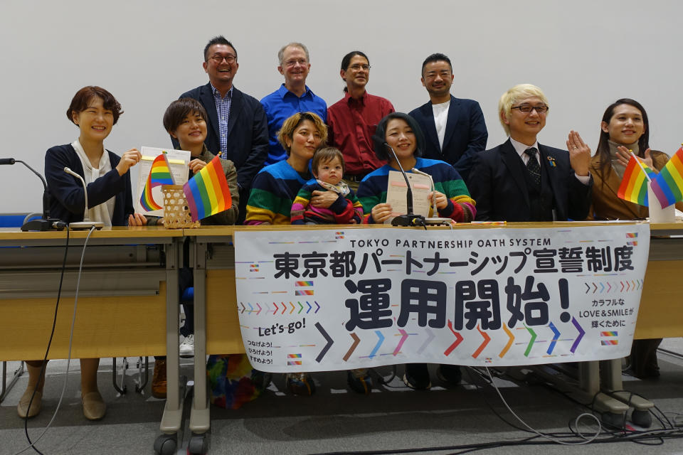 Same-sex couples speak to media at Tokyo metropolitan government as the Japanese capital starts acknowledging same-sex partnerships, Tuesday Nov. 1, 2022, in Tokyo, Japan. The Tokyo Metropolitan Government on Tuesday began issuing certificates recognizing same-sex couples in the Japanese capital, a small improvement toward greater awareness of sexual diversity in a country where same-sex marriage is not allowed. (AP Photo/Mari Yamaguchi)