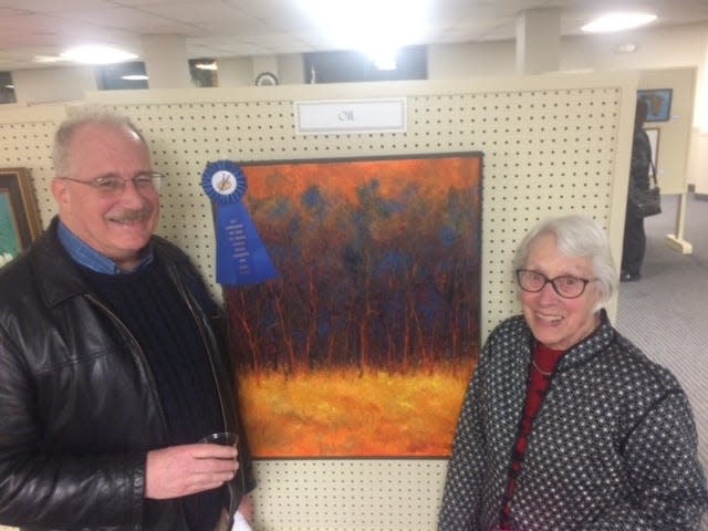 Artist Mark Lore and Greater Gardner Artists Association member Mary Dunn are shown at the 2019 Spring Art Show.