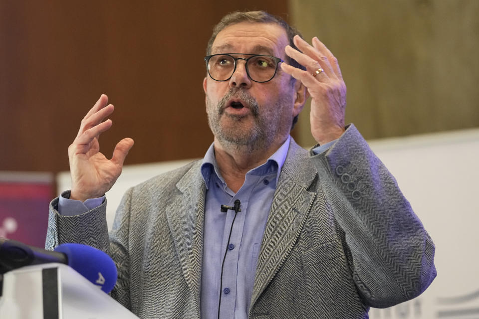 French physicist Alain Aspect speaks during a press conference, Tuesday, Oct. 4, 2022 in Palaiseau, outside Paris. Frenchman Alain Aspect, American John F. Clauser and Austrian Anton Zeilinger were cited by the Royal Swedish Academy of Sciences for discovering the way that unseen particles, such as photons or tiny bits of matter, can be linked, or "entangled," with each other even when they are separated by large distances.(AP Photo/Michel Euler)