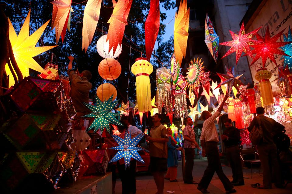 Indians buy lanterns and lamps from roadside stalls ahead of Diwali, the Hindu festival of lights in Mumbai, India.