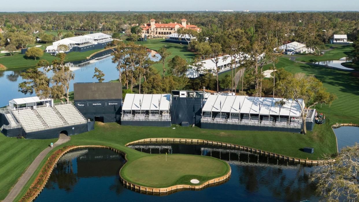 Mandatory Credit: Photo by TANNEN MAURY/EPA-EFE/Shutterstock (10582059as)A picture taken with a drone of empty grandstands around the seventeenth Island green and the clubhouse behind the eighteenth green at TPC Sawgrass in Ponte Vedra Beach, Florida, USA, 13 March 2020.