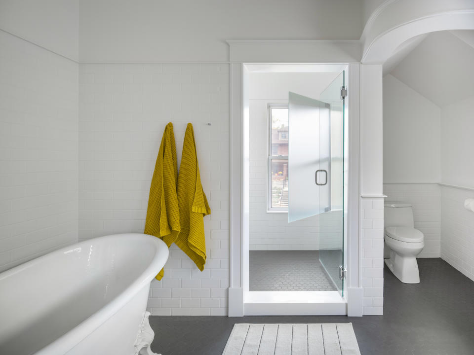 A bathroom with a WC under the arch