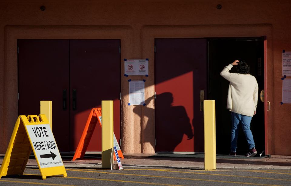 Voters enter the polling site at the Salt River Tribal Recreation Center in Scottsdale, Arizona, Tuesday morning.