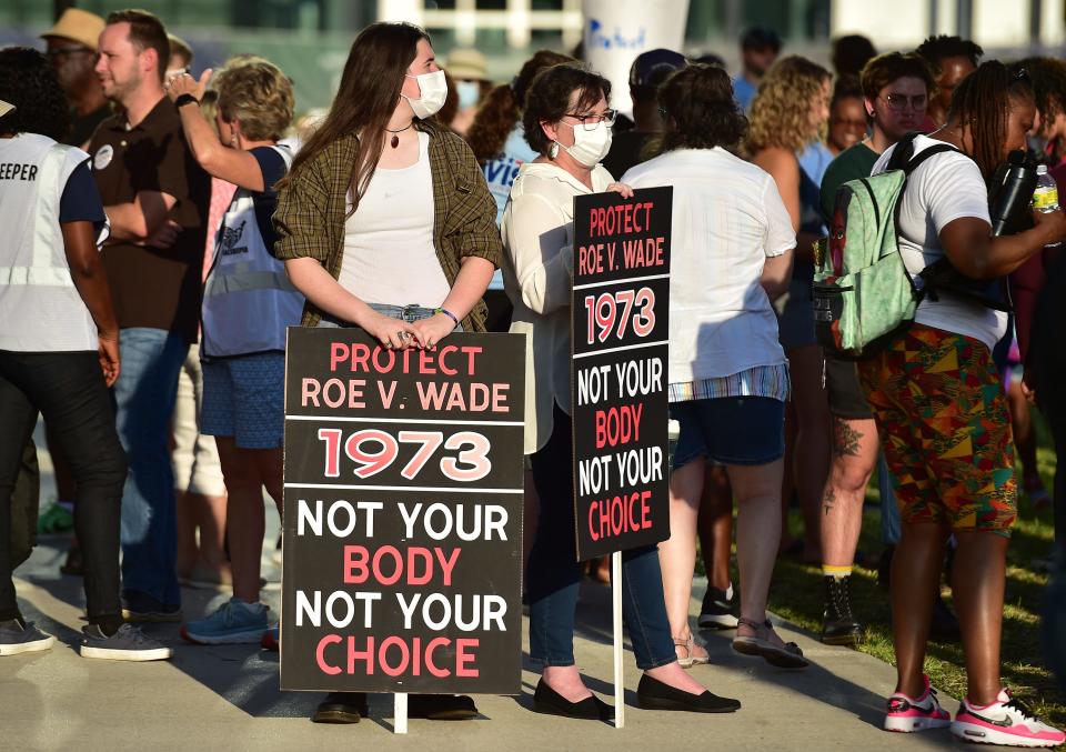 Around 200 people gathered outside the Duval County Courthouse in Jacksonville on May 4, 2022, to express their opposition to the prospect of abortion protections being lifted nationwide. A handful of anti-abortion protesters was also on hand.