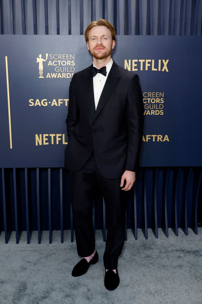 Finneas O'Connell in a tuxedo with bow tie