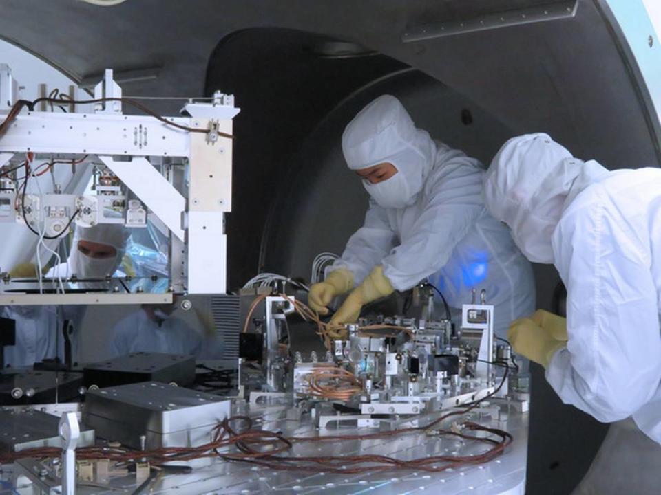 Installation of in-vacuum equipment as a part of the squeezed-light upgrade before Advanced LIGO’s third observing run. LIGO team members install in-vacuum equipment that is part of the squeezed-light upgrade.