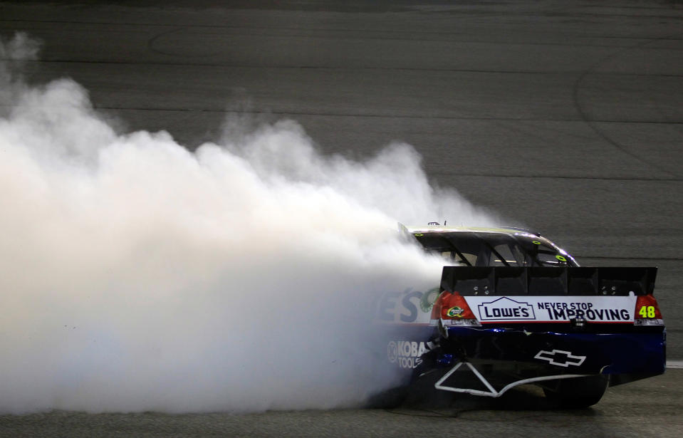 HOMESTEAD, FL - NOVEMBER 20: Jimmie Johnson, driver of the #48 Lowe's Chevrolet, spins out after an incident in the NASCAR Sprint Cup Series Ford 400 at Homestead-Miami Speedway on November 20, 2011 in Homestead, Florida. (Photo by Chris Trotman/Getty Images for NASCAR)