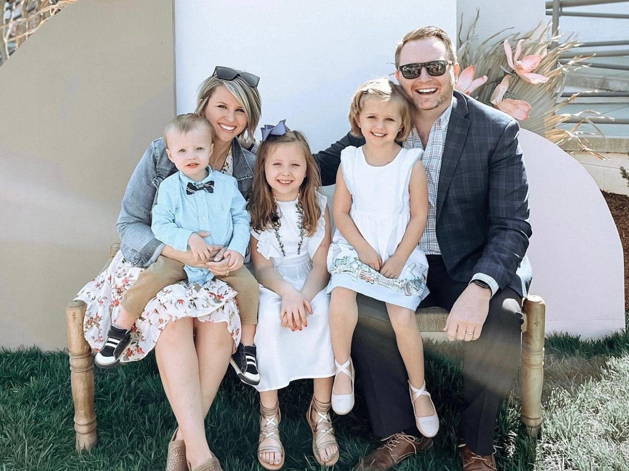 Chad Tucker and his family posing for a photo