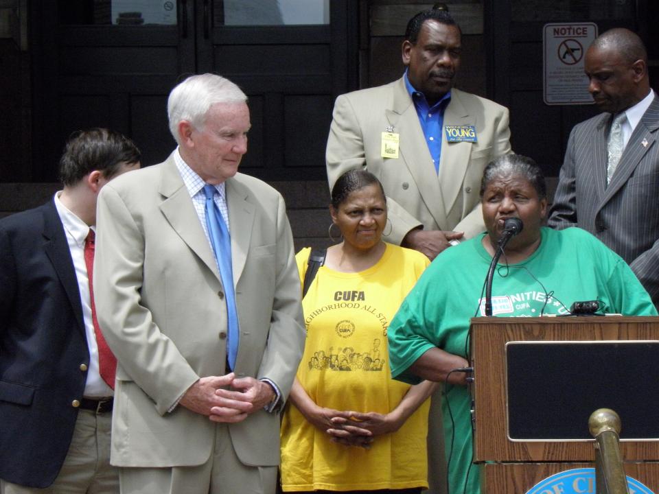 Marilyn Evans, front right, celebrates the adoption of Cincinnati’s Environmental Justice Ordinance in May 2009.  Also celebrating are (front, l to r) Cincinnati Vice Mayor David Crowley and Winton Hills resident Linda Briscoe; (back L to r) Cincinnati Councilmembers Wendell Young and Cecil Thomas.
