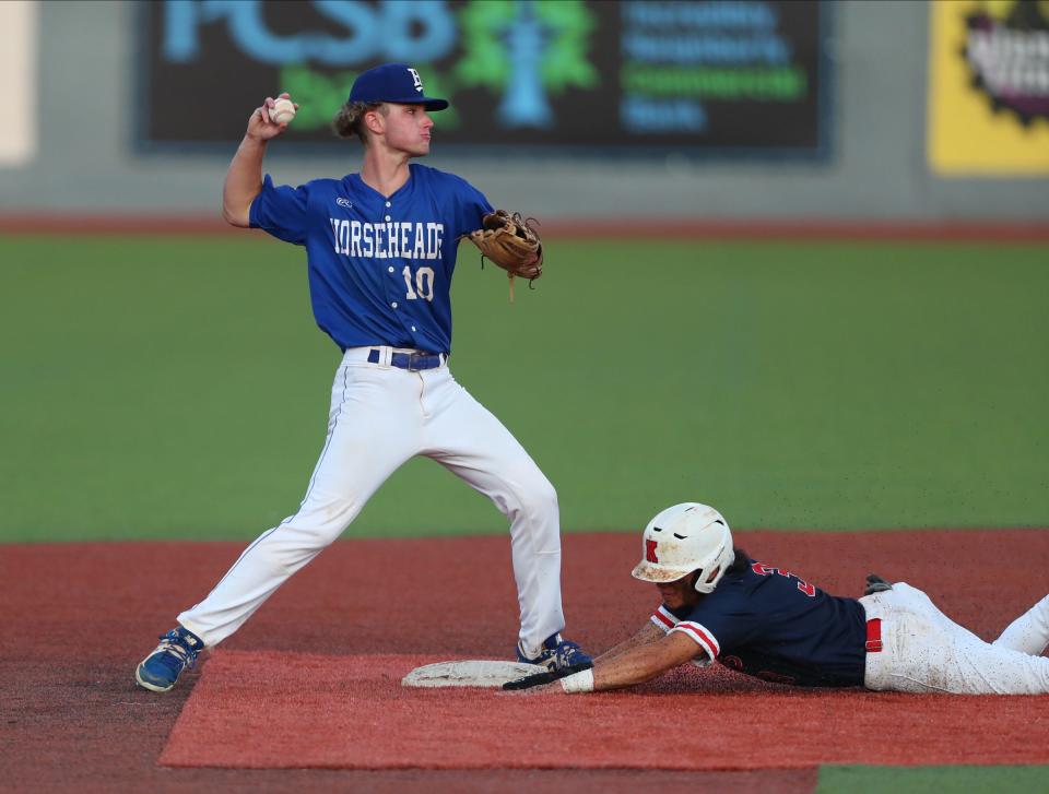 Horseheads second baseman Dominick Russ tries to turn a double play in a 7-1 loss to Ketcham in a Class AA regional semifinal baseball game June 2, 2022 at Dutchess Stadium in Wappingers Falls.