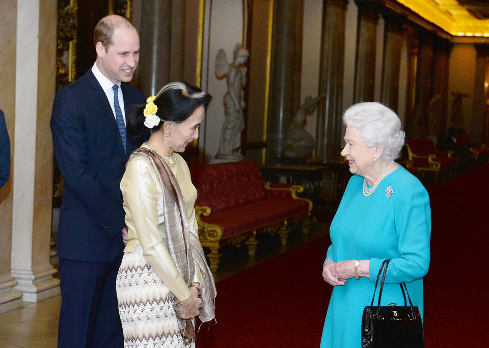 Queen Elizabeth and Prince William greet Aung San Suu Kyi in London