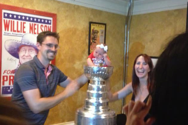 This baby would like to be removed from the Stanley Cup now, please (Photo)