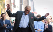 <p>Actor Adam West acknowledges the crowd at the ceremony where he will receive a star on the Hollywood Walk of Fame in Los Angeles, Calif., April 5, 2012. (Photo: Phil McCarten/Reuters) </p>