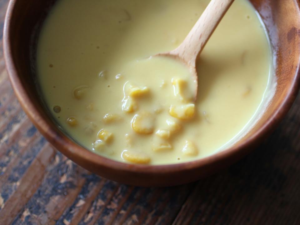 corn chowder in a bowl with a spoon