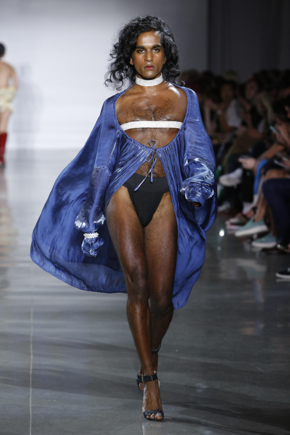 Model with Blue Cape and Heels by Moses Gauntlett Cheng