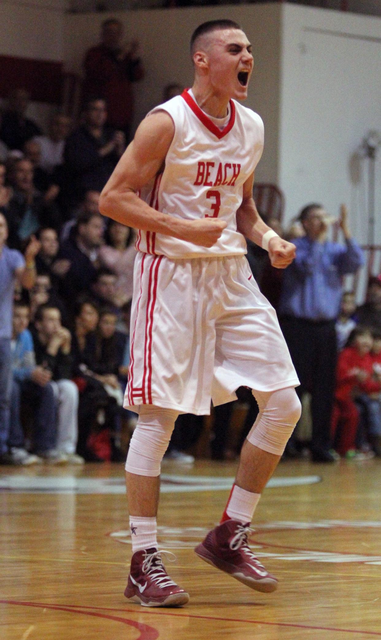 Point Pleasant Beach's Matt Farrell celebrates after a 69-40 win over Bound Brook  in the NJSIAA Boys Central Group I basketball final in 2013.