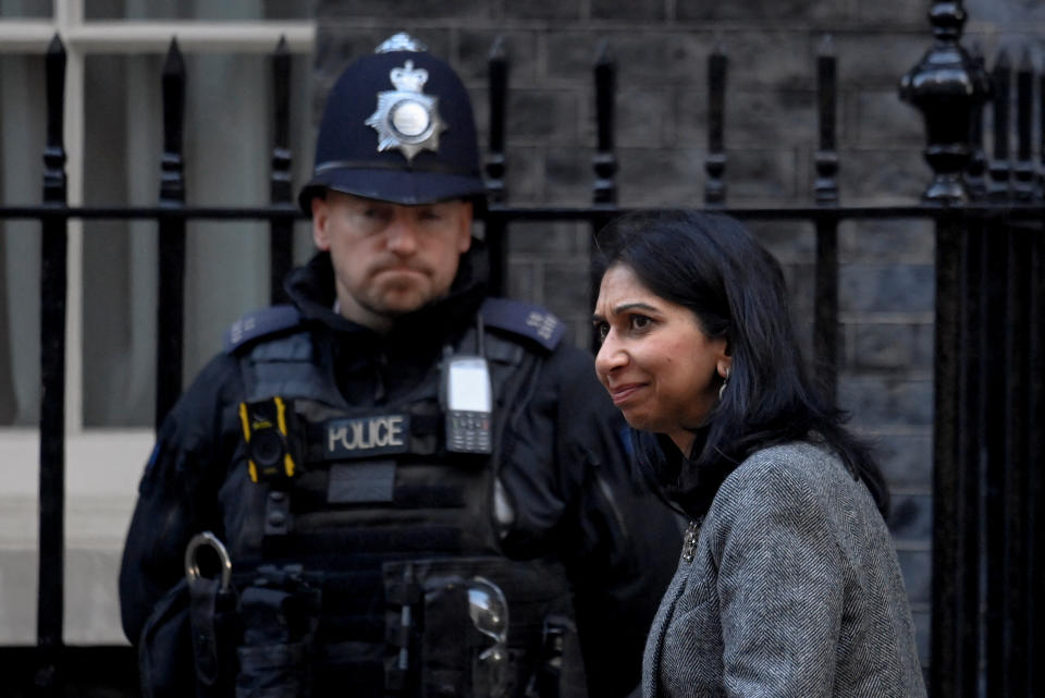 Britain's Secretary of State for the Home Department Suella Braverman walks past a police officer outside Number 10 Downing Street in London, Britain, October 18, 2022. REUTERS/Toby Melville