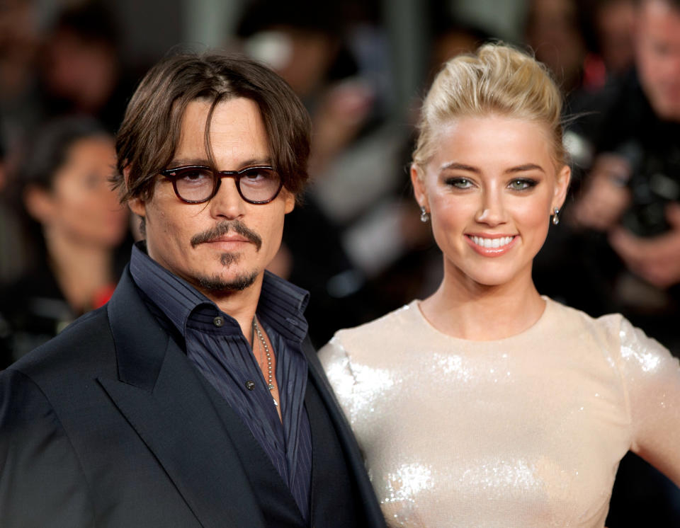 Johnny Depp And Amber Heard Attend The European Premiere Of 'The Rum Diary' At The Odeon Kensington, London. (Photo by John Phillips/UK Press via Getty Images)