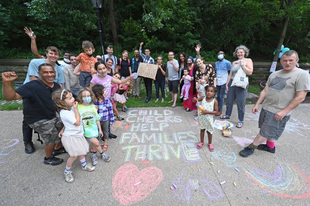 Parents and children in Brooklyn, New York, celebrated monthly Child Tax Credit payments and urged Congress to make them permanent outside Senate Majority Leader Chuck Schumer's (D-N.Y.) home on July 12, 2021. (Photo: Bryan Bedder via Getty Images)