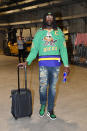 <p>Montrezl Harrell wears a “Mighty Ducks” movie jersey and pine green Jordans at the STAPLES Center on March 31. </p>