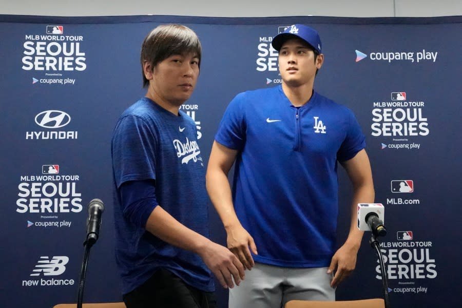 Los Angeles Dodgers’ Shohei Ohtani, right, and his interpreter, Ippei Mizuhara, leave after at a news conference ahead of a baseball workout at Gocheok Sky Dome in Seoul, South Korea, Saturday, March 16, 2024. Ohtani’s interpreter and close friend has been fired by the Dodgers following allegations of illegal gambling and theft from the Japanese baseball star. (AP Photo/Lee Jin-man)