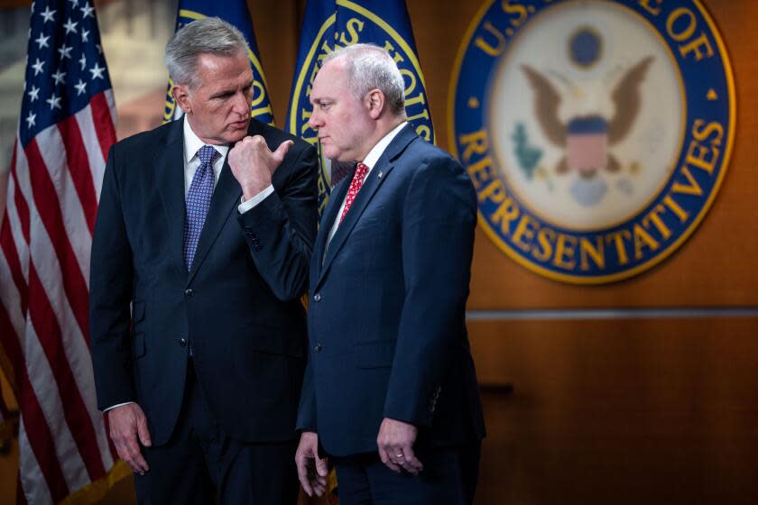 WASHINGTON, DC - DECEMBER 14: House Minority Leader Kevin McCarthy (R-CA) chats with House Minority Whip Steve Scalise (R-LA) during a news conference a press conference on the 2023 Fiscal Year on Capitol Hill on Wednesday, Dec. 14, 2022 in Washington, DC. (Kent Nishimura / Los Angeles Times)