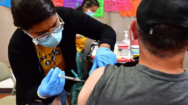 PHOTO: In this May 5, 2022, file photo, a nurse administers the Pfizer booster shot at a COVID-19 vaccination and testing site in Los Angeles. (Frederic J. Brown/AFP via Getty Images, FILE)