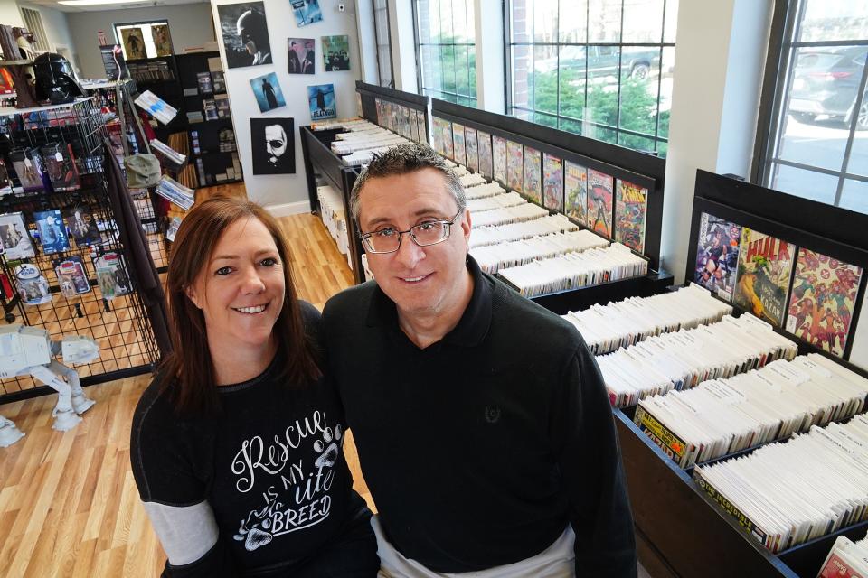 Miller’s Comics owners Taryn Forbes and Rich Reina pose for a photo when they first opened the shop in 2020.