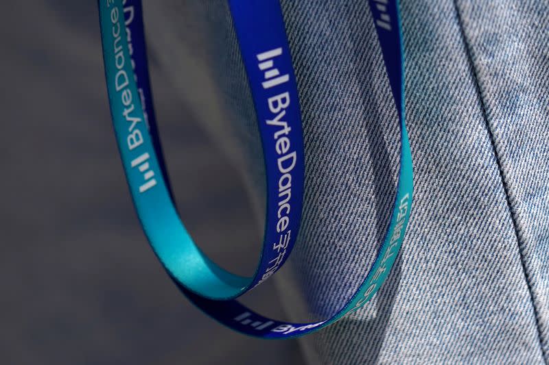 FILE PHOTO: Logos of Bytedance, the China-based company which owns the short video app TikTok, or Douyin, are seen on a strap of an employee card, in Beijing