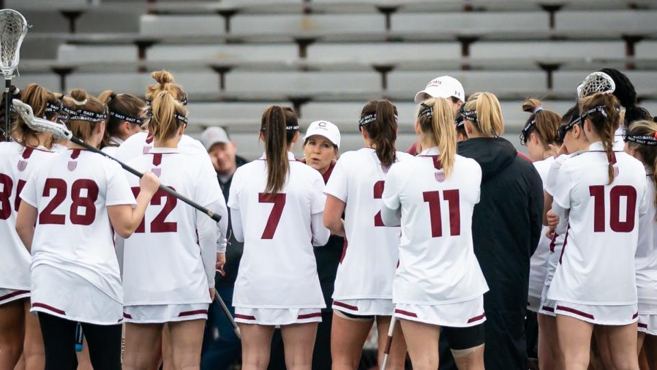 Colgate Women's Lacrosse Head Coach Kathy Taylor gives instructions to her players on the sideline during a home game at Colgate University.