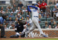 Los Angeles Dodgers' Freddie Freeman strikes out in the first inning during the team's baseball game against the Atlanta Braves on Saturday, June 25, 2022, in Atlanta. (AP Photo/Bob Andres)