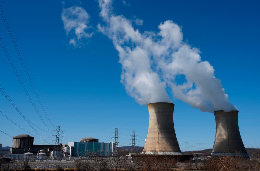Power lines come off of the nuclear plant on Three Mile Island, with the operational plant run by Exelon Generation on the right, in Middletown, Pennsylvania on March 26, 2019. (Photo by ANDREW CABALLERO-REYNOLDS / AFP) (Photo credit should read ANDREW CABALLERO-REYNOLDS/AFP via Getty Images)