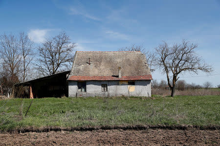 An abandoned house stands in the village of Bacsszentgyorgy, Hungary, April 3, 2018. REUTERS/Bernadett Szabo