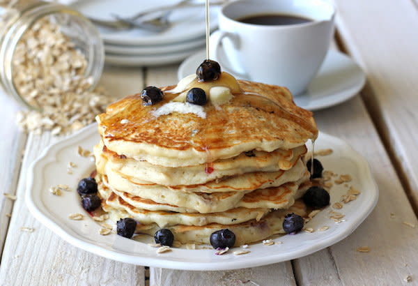 <strong>Get the <a href="http://damndelicious.net/2012/10/18/blueberry-oatmeal-yogurt-pancakes/" target="_blank">Blueberry Oatmeal Yogurt Pancakes recipe</a> from Damn Delicious</strong>