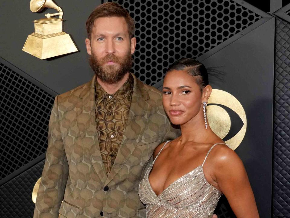 <p>Jeff Kravitz/FilmMagic</p> Calvin Harris and Vick Hope attend the 66th GRAMMY Awards on February 04, 2024 in Los Angeles, California. 