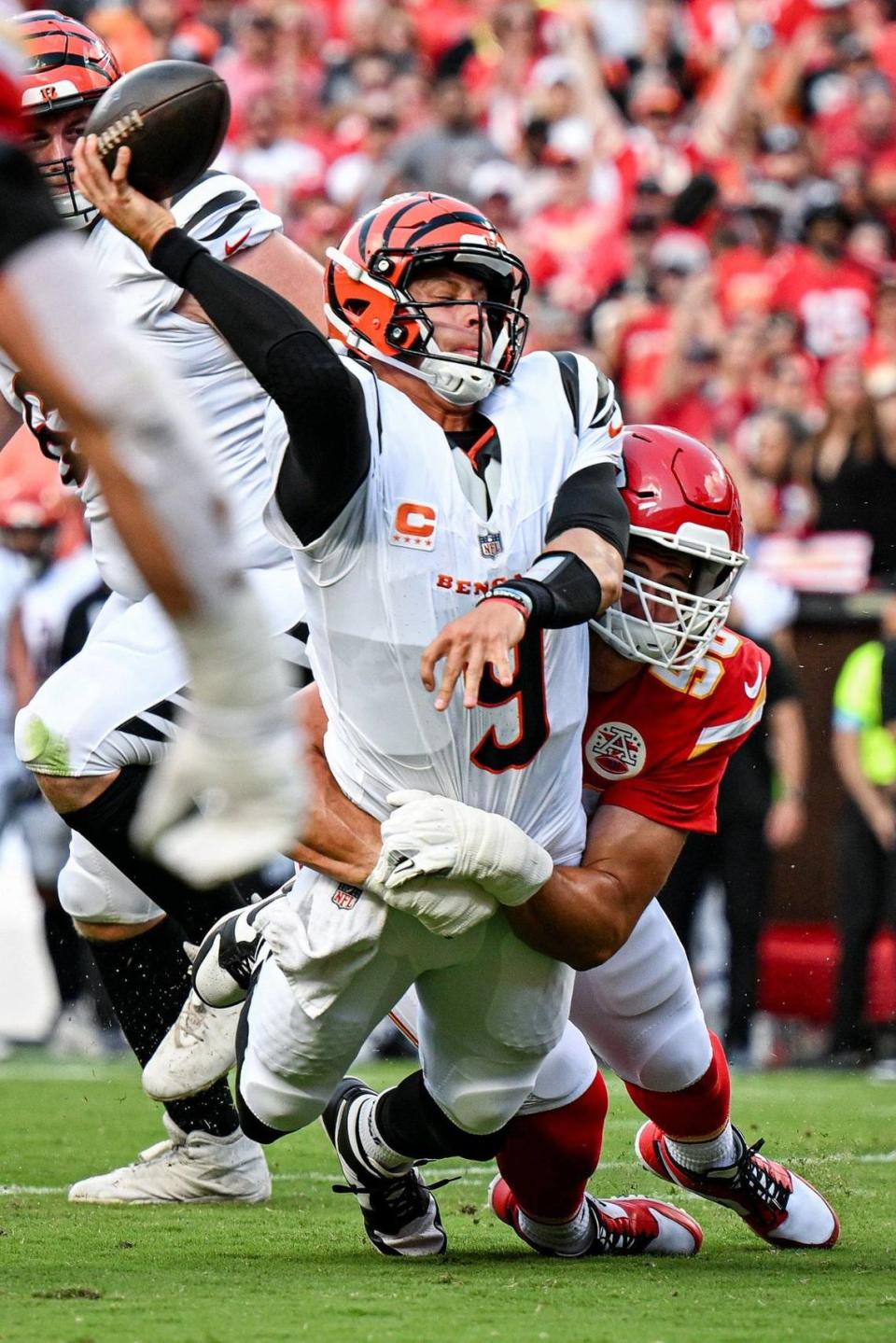 Kansas City Chiefs defensive end George Karlaftis (56) tackles Cincinnati Bengals quarterback Joe Burrow (9) in the first quarter Sunday, Sept. 15, 2024, at GEHA Field at Arrowhead Stadium.